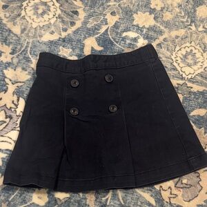 Navy blue uniform skirt with shorts inside